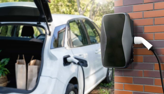 EV charger mounted on a brick wall